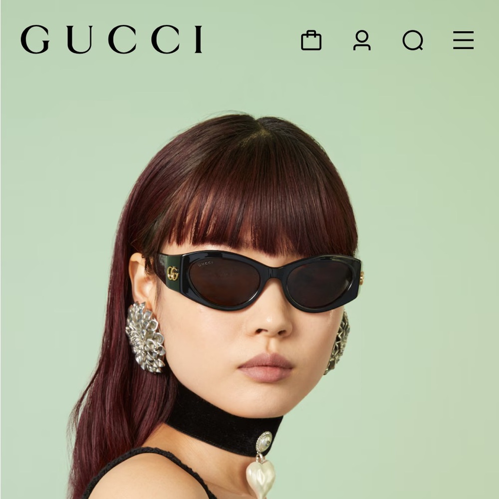 Gucci Black Cat-Eye Sunglasses with Gold Logo
